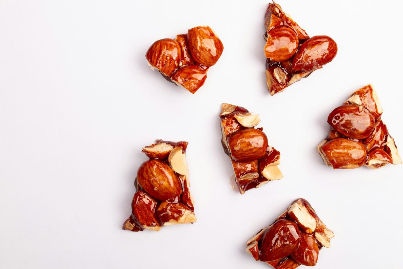 Glazed almond pieces with a deep, even crunch